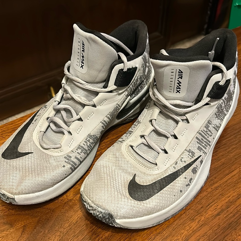 Gray Nike AirMax basketball shoes